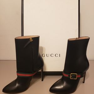 NEW IN BOX GUCCI BOOTS COMES WITH DUST BAG/NEW HEELS 300.00 OR OFFER